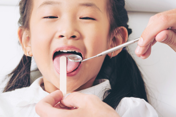 Pediatric dentistry for children's oral health at Srivari Dental Clinic.